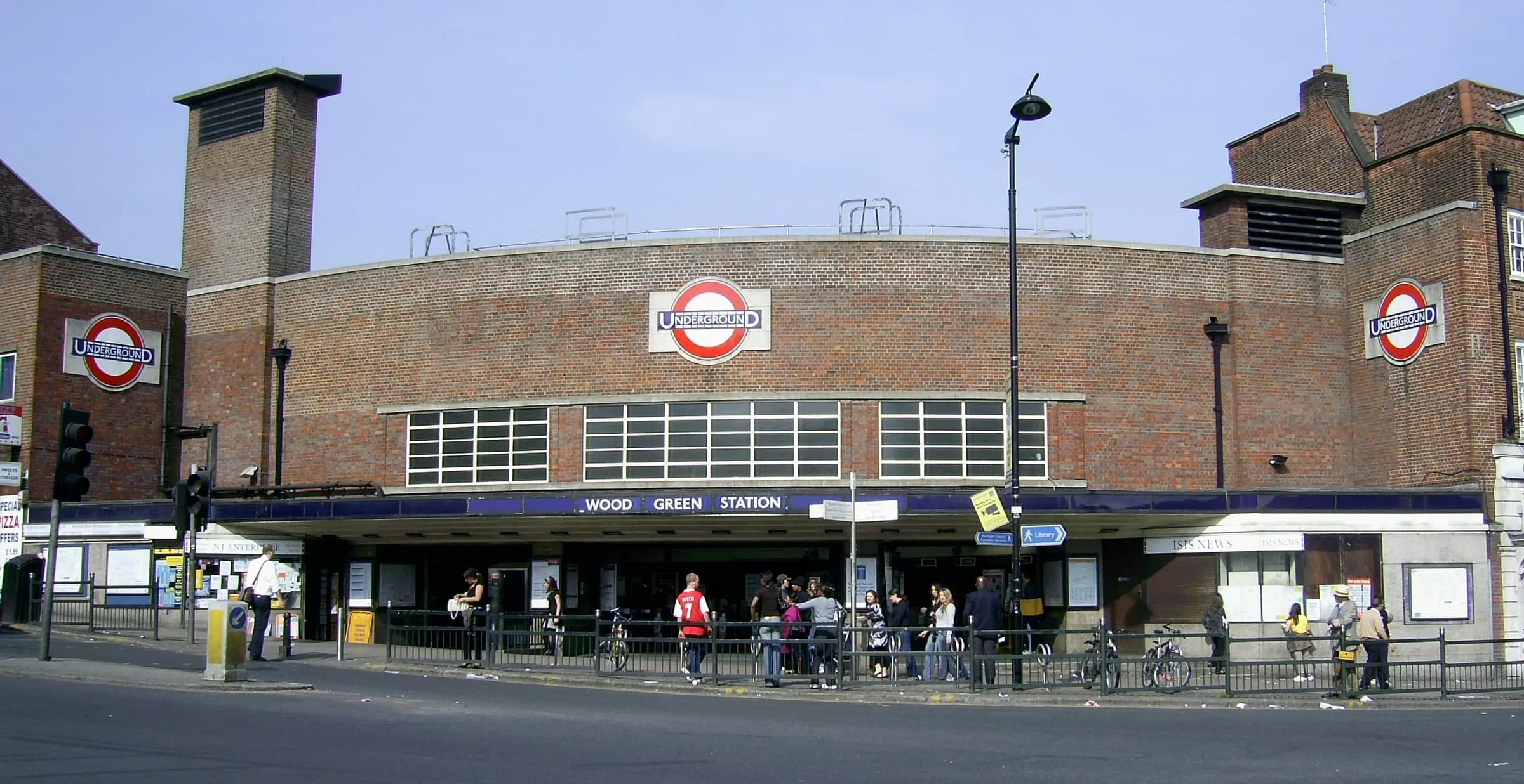 Wood Green Underground station's curved brick building and roundel